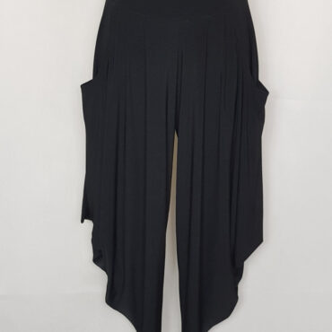 pantalon sarouel femme chic taille élastiquée. | Le pantalon bouffant noir, ample et confortable, Il s'associe avec une  hauts, allant des tops près du corps aux blouses légères.