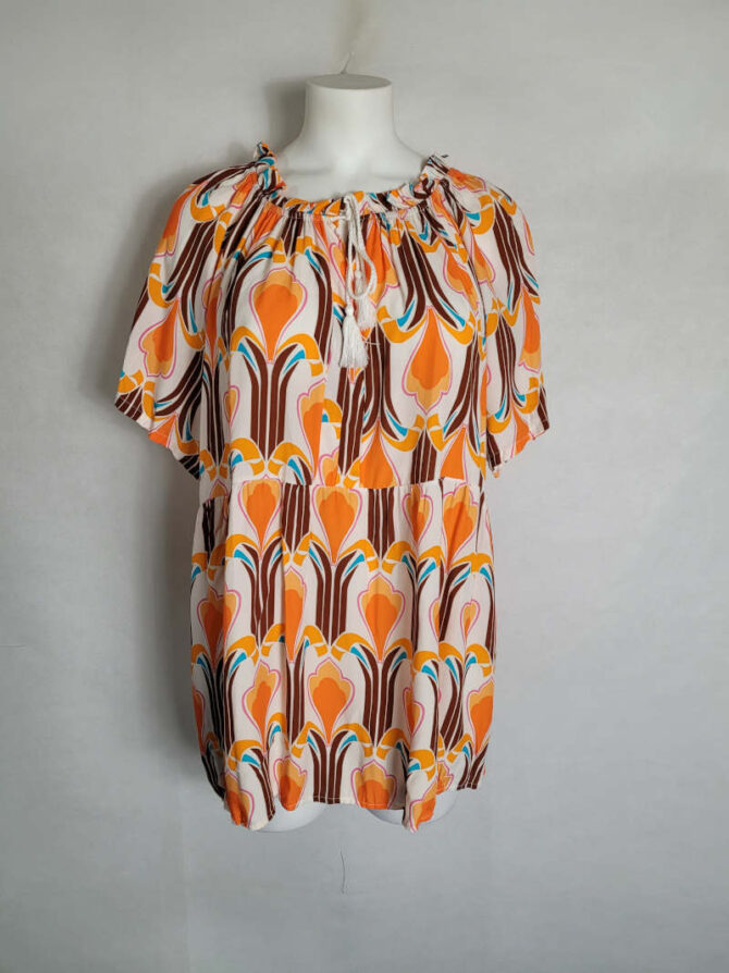 tunique grande taille originale Cette tunique bohème ornée d'un motif baroque vert est spécialement conçue pour les silhouettes généreuses. blouse bohème pour femme