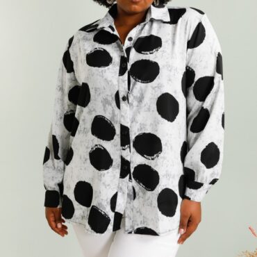 Vêtement coloré large avec col v et motif manches longues