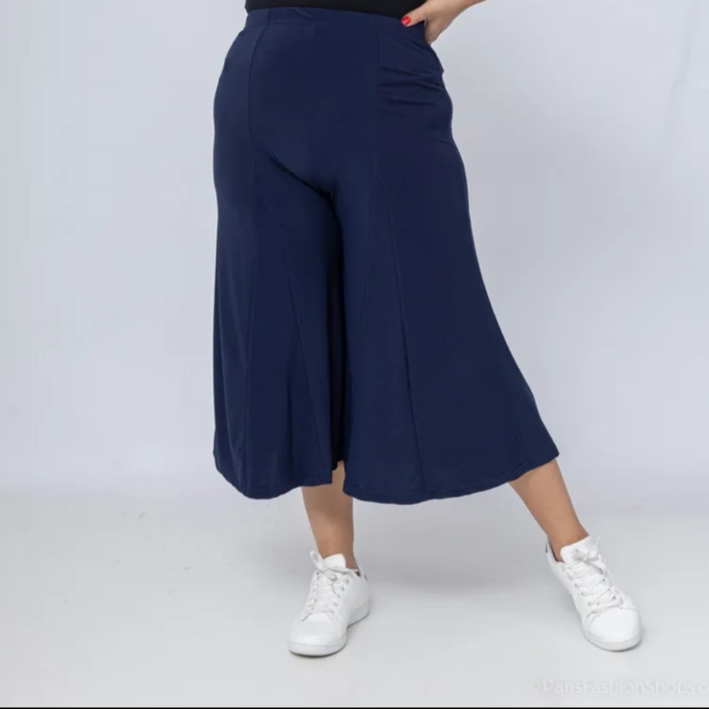 jupe culotte courte fluide femme coupe évasée matière extensible convient pour toutes les silhouettes.